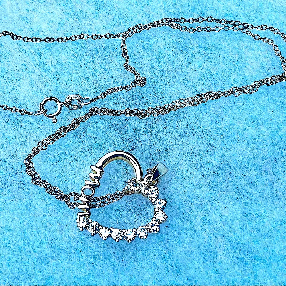 Silver and CZs spell Mom necklace 💐